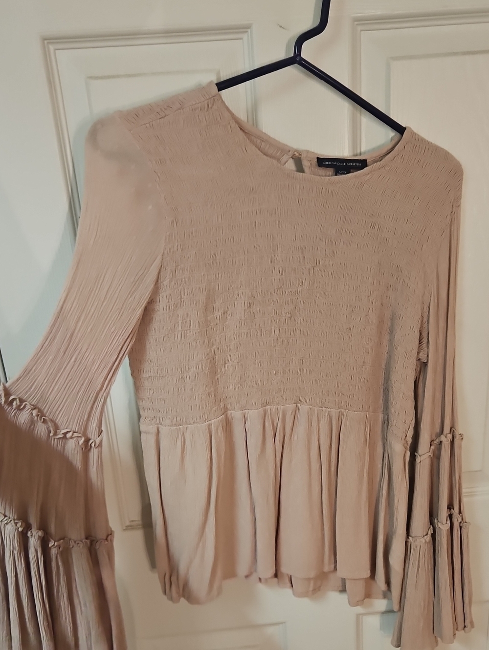Women’s Blush Peplum Long-Sleeve Top